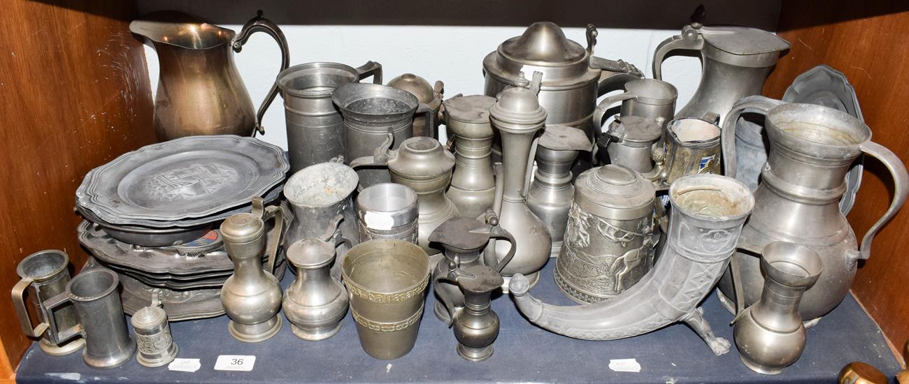 Lot 36 - ~ A quantity of Continental pewter items, tankards, ewers and plates etc including Belgian, Spanish