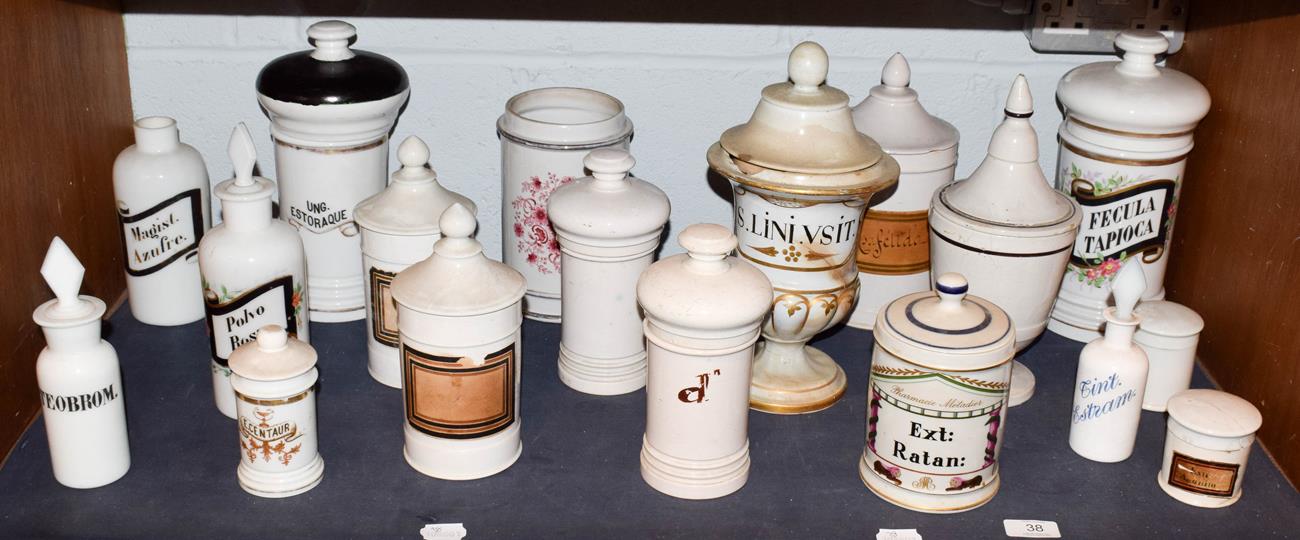Lot 38 - ~ A quantity of Spanish pottery and opaque glass apothecary jars and other storage vessels and...