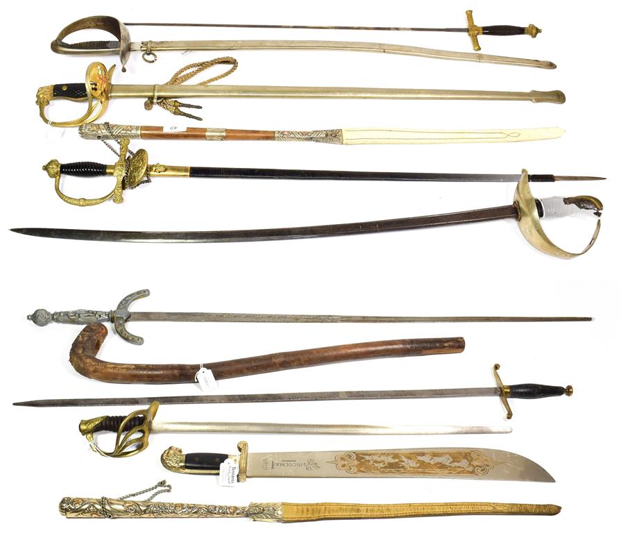 Lot 42 - ~ Two Argentinean strap whips; a quantity of German and other copy swords and a shillelagh