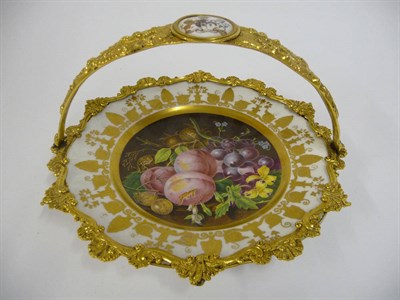 Lot 113 - A Gilt Metal Mounted French Porcelain Basket, painted with a still life of fruit within gilt...