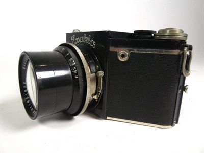 Lot 71 - ~ Vintage cameras including bellows cameras and a Bakelite model 35 spy camera, makers include...