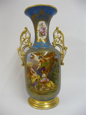 Lot 114 - A French Porcelain Baluster Vase, circa 1860, with trumpet neck and high scroll handles, painted in