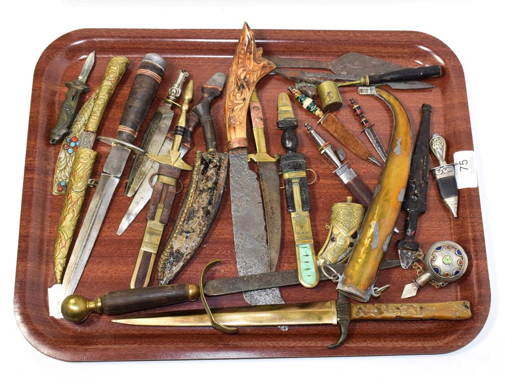 Lot 75 - ~ A quantity of knives and dagger etc including leather and metal mounted examples, together...