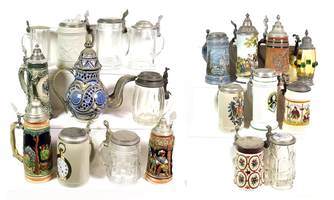 Lot 76 - ~ A collection of mainly German pewter lidded pottery and glass steins including an amber glass...