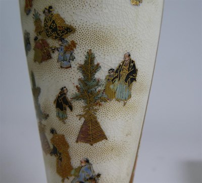 Lot 92 - ~ A pair of Japanese Meiji period slender Satsuma vases decorated with figure and landscape...
