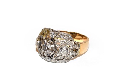 Lot 104 - ~ A diamond three stone cluster ring, the three graduated old cut diamonds within a pierced...