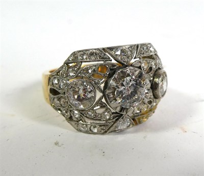 Lot 104 - ~ A diamond three stone cluster ring, the three graduated old cut diamonds within a pierced...