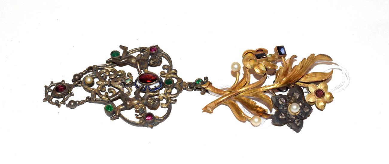 Lot 105 - ~ A late 19th century gilt floral spray brooch set with rose cut diamonds, a synthetic sapphire...