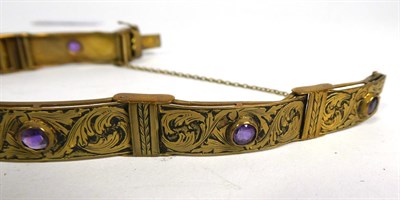 Lot 107 - ~ A collection of circa 1900 gilt jewellery including a bracelet formed of floral and scroll...