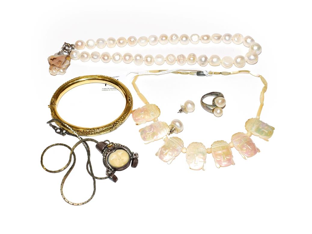 Lot 111 - ~ A plated bangle (a.f.); a simulated pearl necklace; a pair of simulated pearl earrings; a...