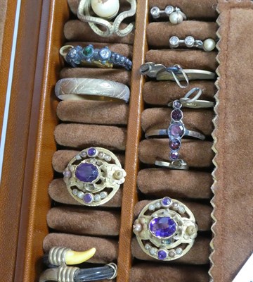 Lot 112 - ~ A quantity of costume jewellery including a scarab ring; paste set rings; earrings; drop...