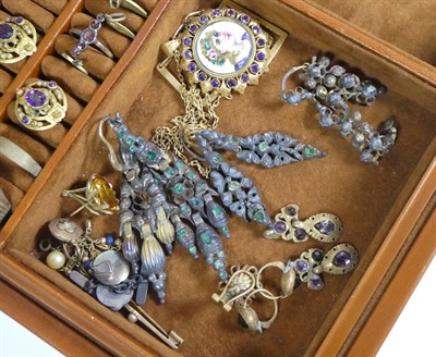 Lot 112 - ~ A quantity of costume jewellery including a scarab ring; paste set rings; earrings; drop...