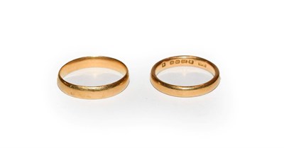 Lot 126 - Two 22 carat gold band rings, finger sizes J and L1/2