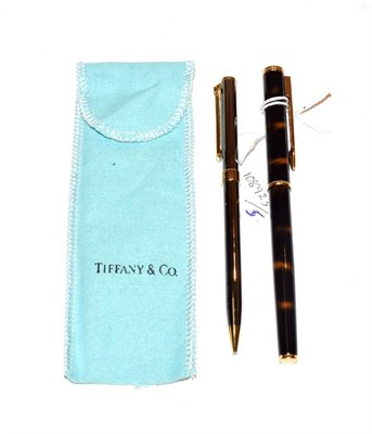 Lot 136 - A Waterman's fountain pen, nib stamped 18k / 750 together with a Tiffany & Co. propelling...