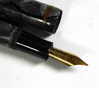 Lot 144 - A Merlin 33 fountain pen with nib stamped 14k, a Merlin 33 fountain pen with nib stamped 14k-585, a