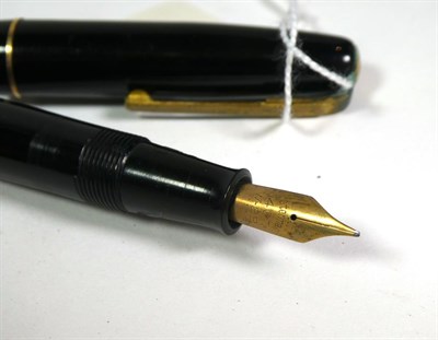 Lot 146 - A Waterman's W-3 fountain pen with nib stamped 14ct and matching pencil, a Waterman's W-2...