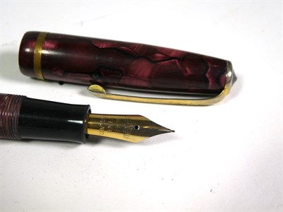 Lot 149 - A Parkette fountain pen with nib stamped 14-ct, a Mabie, Todd & Co. fountain pen stamped Swan...