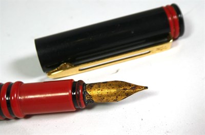 Lot 150 - A Wyvern Perfect Pen No.81 with nib stamped 14ct, the Popular Prince fountain pen with nib...