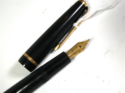 Lot 160 - Two Parker Slimfold fountain pens each with nibs stamped 14k, another Parker fountain pen with...