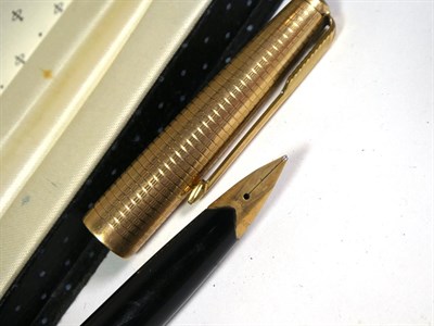 Lot 162 - A Parker Senior Duofold fountain pen with nib stamped 14K, a Parker Duofold fountain pen, two other