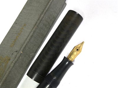 Lot 166 - A Sheaffer fountain pen with nib stamped 14K in a lattice work case and with matching pencil, a...