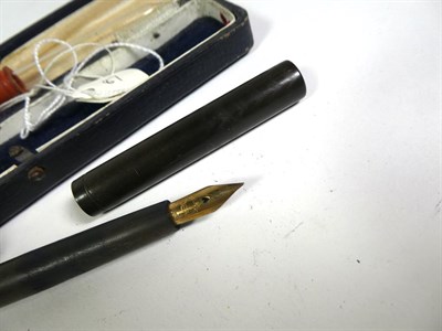 Lot 171 - A Waterman's W-3 fountain pen with nib stamped 14ct, a Waterman's fountain pen with nib stamped...