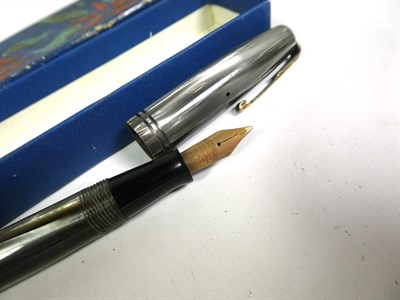 Lot 171 - A Waterman's W-3 fountain pen with nib stamped 14ct, a Waterman's fountain pen with nib stamped...