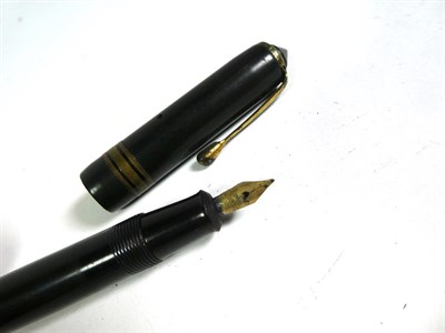 Lot 172 - A Waterman's fountain pen with nib stamped 14ct, a Conway 106 fountain pen, a Golden Sovereign...