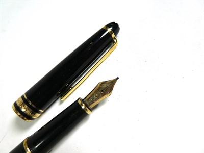 Lot 173 - A Montblanc Meisterstück fountain pen, Numbered MK1285169, the nib engraved with foliage and '4810