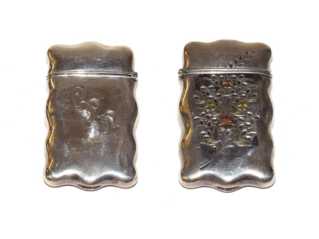 Lot 200 - An American silver and mixed metal vesta-case, stamped Sterling, Circa 1900, shaped oblong, the...
