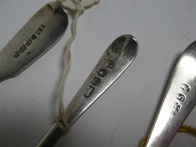 Lot 217 - Two George III silver picture back teaspoons, the back of the bowl of the first stamped with a...