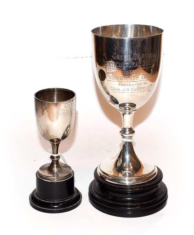 Lot 227 - A George V silver cup and an Elizabeth II silver cup, The First by Edward Barnard and Sons...