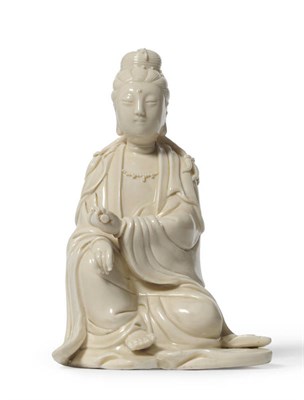 Lot 130 - A Chinese Blanc de Chine Dehua Kilns, Fujian Porcelain Figure of Guanyin, bearing the impressed...