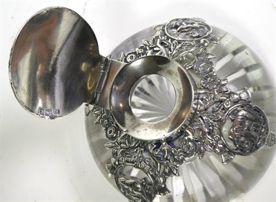 Lot 234 - An Edward VII silver-mounted glass-inkwell, by Samuel Jacob, London, 1902, the glass body...