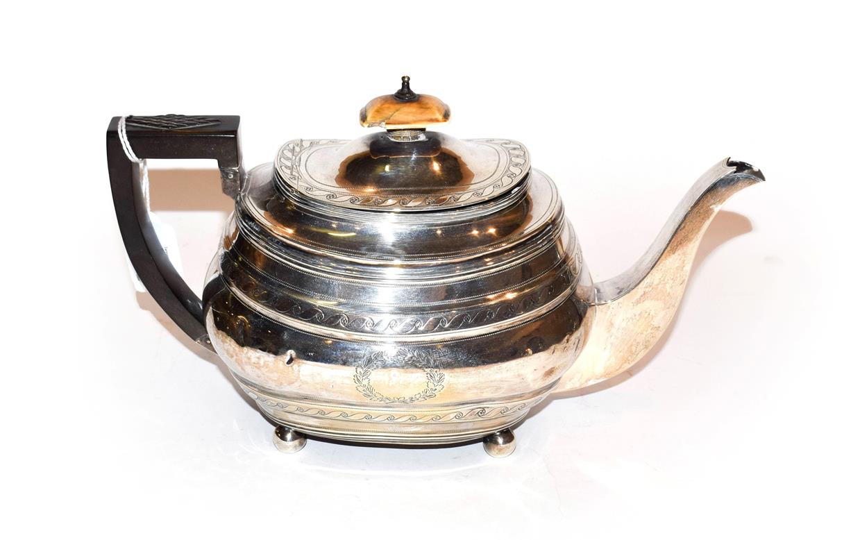 Lot 235 - A George III silver teapot, by Thomas Wallis and Jonathan Hayne, London, 1810, oblong and on...