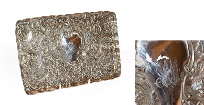 Lot 238 - A Victorian silver dressing-table tray, by William Comyns, London, 1894, shaped oblong, stamped...