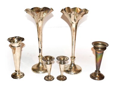 Lot 239 - A group of silver vases, including: a pair by R & W Sorley, London, 1901, 25.5cm high; a pair...