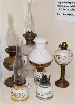 Lot 263 - Six Victorian oil lamps, including glass examples with enamel decoration (6)