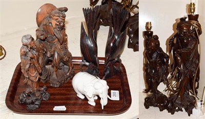 Lot 265 - A group of South East Asian carved root wood lamps and figures together with a 19th century...
