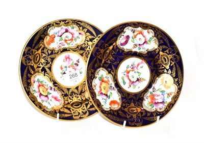 Lot 268 - A pair of early 19th century English porcelain plates, Coalport style, decorated with floral...
