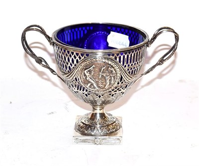 Lot 275 - A late Victorian silver twin handled pedestal sugar basket by George Nathan & Ridley Hayes....