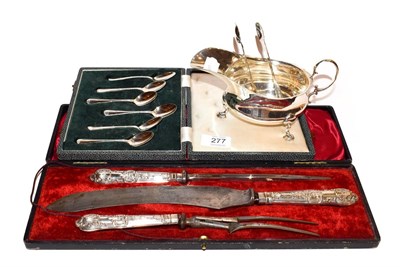 Lot 277 - A three piece silver handled carving set, a set of six silver tea spoons, a silver sauce boat...