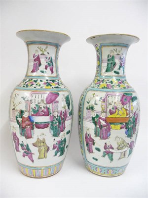 Lot 136 - A Pair of Cantonese Porcelain Baluster Vases, 19th century, with flared rims, typically painted...