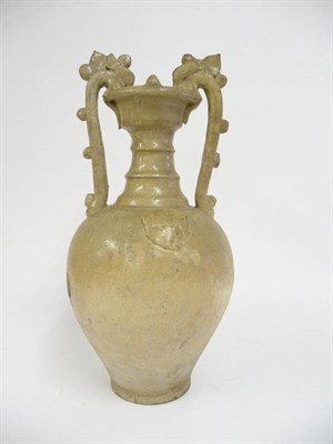 Lot 138 - A Chinese Porcelain Straw Glaze Funerary Jar, in Tang style, the ribbed flared neck with...