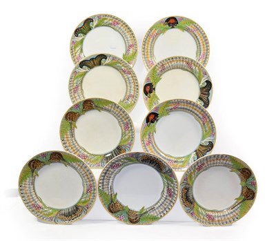 Lot 331 - A set of nine Victorian Minton game plates the boarders decorated with pheasants, 25.5cm diameter