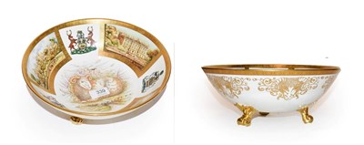 Lot 339 - A Coalport gilt highlighted bowl decorated with country houses, titled ''The Derby Ram''...