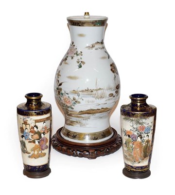 Lot 349 - An early 20th century Japanese vase decorated with birds on a hardwood stand 36cm (including stand)