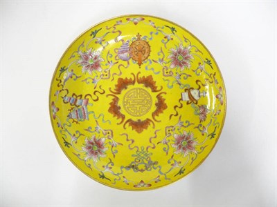 Lot 142 - A Chinese Porcelain Yellow Ground Saucer Dish, six character mark of Guangxu (1875-1908) and...