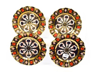 Lot 362 - A set of four Royal Crown Derby Imari plates with scalloped rims, 22cm diamater