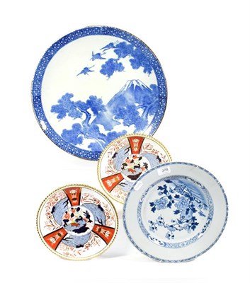 Lot 378 - A Chinese blue and white dish; a Japanese black and white charger and two Spode dishes in Imari...